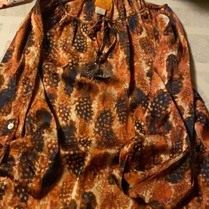 Really nice ladies blouse with feather print and ties
